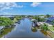 Scenic waterfront community showing a canal with private docks and beautiful homes at 9532 Miami Cir, Port Charlotte, FL 33981