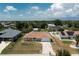 An exterior view of the house with a driveway at 10116 Melanie Ave, Englewood, FL 34224