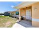 A charming front door with a small garden at 10116 Melanie Ave, Englewood, FL 34224