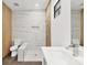Contemporary bathroom features a walk-in shower with decorative tile and a modern vanity at 10242 Hallendale Dr, Port Charlotte, FL 33981