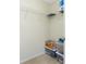 Walk-in closet featuring wire shelving and storage bins, creating organization and neatness at 1247 Nora Ln, North Port, FL 34286