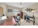 Bright office with a large desk, plush chair, and natural light, designed for productivity at 13080 Proctor Ave, Port Charlotte, FL 33981