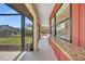 Enclosed lanai area featuring a bar with granite countertop overlooking the backyard at 13080 Proctor Ave, Port Charlotte, FL 33981