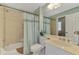 Bathroom featuring a shower and tub combination with a blue shower curtain at 13282 Scrub Jay Ct, Port Charlotte, FL 33953