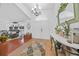 Welcoming foyer leading to a bright living room with views of backyard at 13703 Drysdale Ave, Port Charlotte, FL 33981
