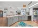 Well-equipped kitchen with stainless steel appliances, granite countertops, and a breakfast bar at 13703 Drysdale Ave, Port Charlotte, FL 33981