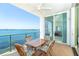 Spacious balcony area includes table with seating and waterfront view at 1375 Beach Rd # 201, Englewood, FL 34223