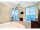 Bedroom features waterfront views and a private balcony at 1375 Beach Rd # 201, Englewood, FL 34223