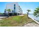 Charming waterfront condo with parking, lush landscaping, and serene water views, a peaceful coastal retreat at 1375 Beach Rd # 201, Englewood, FL 34223