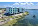 Stunning waterfront condo with private balconies and a shared pool, offering serene coastal living at 1375 Beach Rd # 201, Englewood, FL 34223