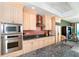 Well-equipped kitchen with stainless steel appliances, ample cabinetry, and granite countertops at 1375 Beach Rd # 201, Englewood, FL 34223
