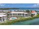 Condo community with a pool, waterfront access, and beautifully landscaped grounds at 1501 Beach Rd # 310, Englewood, FL 34223