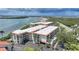 Waterfront condo complex with spacious units, private balconies, and convenient parking at 1501 Beach Rd # 310, Englewood, FL 34223