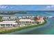 Waterfront condos with a community pool, lush landscaping, and stunning panoramic water views at 1501 Beach Rd # 310, Englewood, FL 34223
