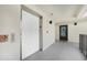 Hallway featuring an elevator and access to unit 304 at 1501 Beach Rd # 310, Englewood, FL 34223