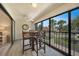Comfortable patio featuring a high top table with chairs, offering views of the neighborhood at 1501 Beach Rd # 310, Englewood, FL 34223