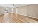 Bright living space featuring new wood flooring and neutral paint at 1730 Manasota Beach Rd # 204, Englewood, FL 34223