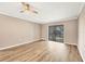 Spacious living room with new wood flooring at 1730 Manasota Beach Rd # 204, Englewood, FL 34223