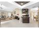 Open concept kitchenette with dark wood cabinetry, granite counters, and stainless steel appliances at 209 Fairway Rd, Rotonda West, FL 33947