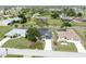 An aerial view showing the property with an inviting outdoor living space at 21 Sportsman Way, Rotonda West, FL 33947