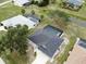 Expansive aerial view showcases pool homes, lush landscaping, and a serene waterway at 21 Sportsman Way, Rotonda West, FL 33947
