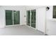 Covered patio with sliding glass doors for seamless indoor-outdoor living at 21 Sportsman Way, Rotonda West, FL 33947