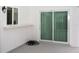 Covered patio with sliding glass doors leading to the backyard at 21 Sportsman Way, Rotonda West, FL 33947