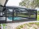 Enjoy the outdoors with this screened-in pool, perfect for relaxing and escaping the sun at 21 Sportsman Way, Rotonda West, FL 33947
