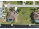 Aerial view of waterfront property with large backyard and private pool at 2295 Chilcote Ter, Port Charlotte, FL 33981