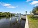 Waterfront property with a private boat dock, providing easy access to the open water at 2295 Chilcote Ter, Port Charlotte, FL 33981