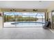 Wonderful screened-in pool with a view of the river and tropical foliage at 2295 Chilcote Ter, Port Charlotte, FL 33981