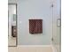 Well-lit bathroom with a glass enclosed shower, and towel rack at 232 Southampton Ln # 259, Venice, FL 34293