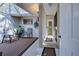Charming outdoor patio area with comfortable seating and ample natural light at 232 Southampton Ln # 259, Venice, FL 34293