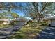 Charming single-story home featuring mature trees, and well-maintained landscaping at 232 Southampton Ln # 259, Venice, FL 34293