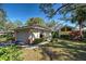 Charming single-story home with a two-car garage, well-manicured lawn and colorful landscaping at 232 Southampton Ln # 259, Venice, FL 34293