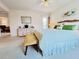 Inviting bedroom with comfortable bed, dresser, and peaceful ambiance creating a relaxing retreat at 2380 N Beach Rd # 210, Englewood, FL 34223
