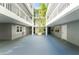 Interior courtyard showing multiple floors and access to individual units at 2380 N Beach Rd # 210, Englewood, FL 34223
