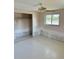 Bedroom featuring a ceiling fan, a closet, and a window at 310 Green Dolphin Dr, Placida, FL 33946