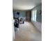 Spacious living room with tiled floor and a window, ready for customization at 310 Green Dolphin Dr, Placida, FL 33946