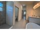 Bright bathroom featuring shower, bathtub and double vanity sinks at 311 Yule St, Port Charlotte, FL 33953