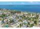 Stunning aerial view of a waterfront neighborhood with lush greenery and serene water at 39 1St Ave, Englewood, FL 34223