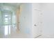 Bright hallway with recessed lighting, tile flooring, and a modern aesthetic at 398 Sunset N Rd, Rotonda West, FL 33947