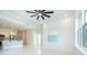 Bright and airy living room with a ceiling fan, recessed lighting, and modern design at 398 Sunset N Rd, Rotonda West, FL 33947