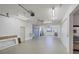 Expansive garage space with plenty of room for vehicles, storage, and workshop area at 4219 Spire St, Port Charlotte, FL 33981