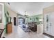 Inviting living room featuring tile flooring, neutral color palette, and sliding glass doors at 4225 Fairway Dr, North Port, FL 34287