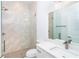 Elegant bathroom featuring a glass-enclosed shower, modern vanity, and stylish fixtures at 482 Sunset N Rd, Rotonda West, FL 33947