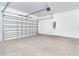 Large garage featuring a sectional garage door and plenty of space at 482 Sunset N Rd, Rotonda West, FL 33947