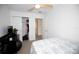 Bedroom featuring a closet and doorway, neutral carpet, and a Peloton exercise bike setup at 5009 Skyview Ln, Bradenton, FL 34211