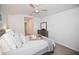 Serene bedroom featuring plush carpeting, a ceiling fan, and a calm color palette at 5009 Skyview Ln, Bradenton, FL 34211