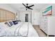 Relaxing bedroom with a ceiling fan, water view, and chest of drawers at 5174 Conner Ter, Port Charlotte, FL 33981